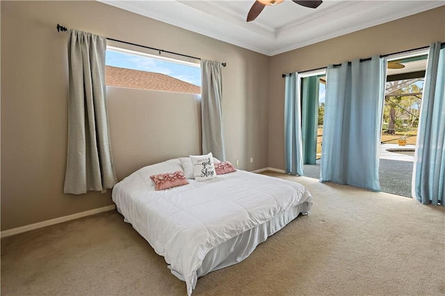 6029 Winfield Dr, Port St Lucie, FL 34986 - bedroom featuring crown molding, baseboards, multiple windows, and light carpet