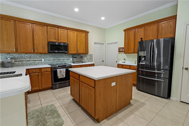 6029 Winfield Dr, Port St Lucie, FL 34986 - kitchen featuring black fridge with ice dispenser, brown cabinetry, range with electric stovetop, a center island, and stainless steel microwave