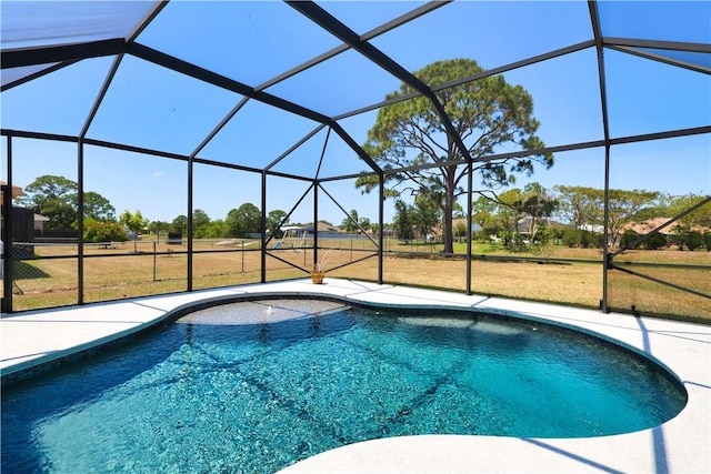 6029 Winfield Dr, Port St Lucie, FL 34986 - pool featuring a lawn, a lanai, and a patio