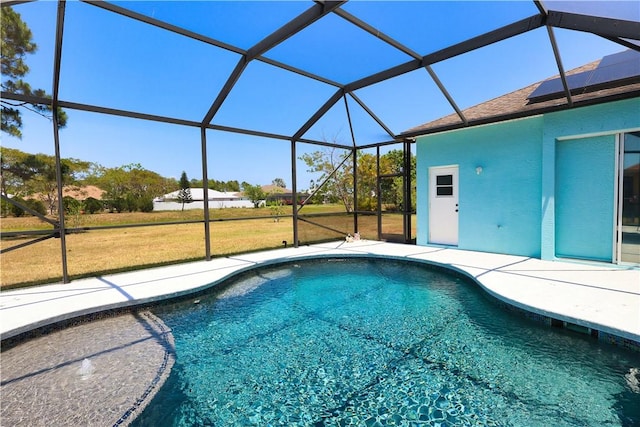 6029 Winfield Dr, Port St Lucie, FL 34986 - outdoor pool featuring a yard, a patio, and glass enclosure