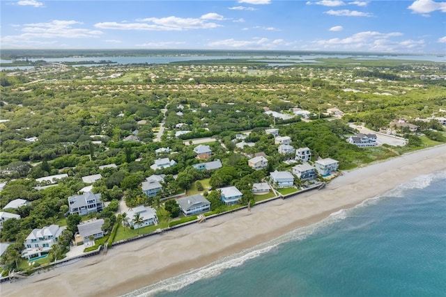 drone / aerial view with a view of the beach and a water view