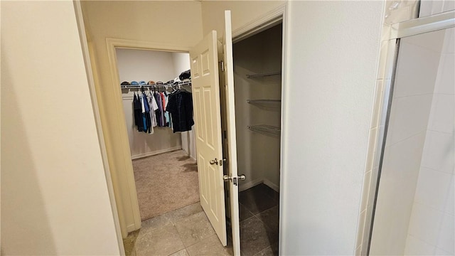 2735 Hanover St SW, Vero Beach, FL 32968 - hall featuring light tile patterned floors and light colored carpet