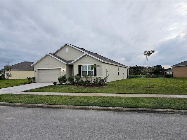 2735 Hanover St SW, Vero Beach, FL 32968 - single story home with a front yard, driveway, and a garage