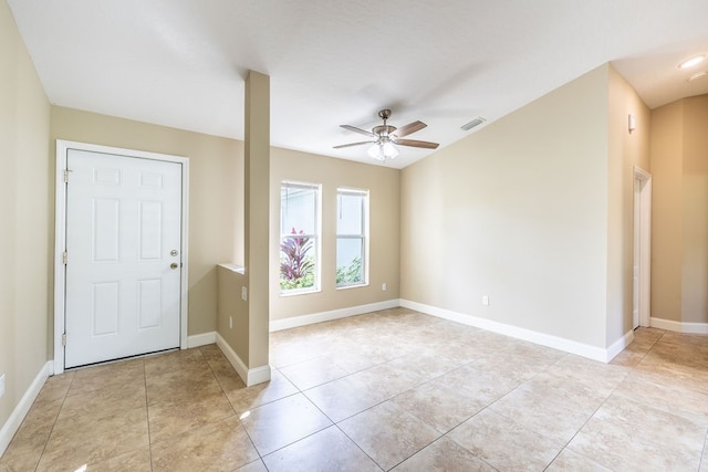 tiled foyer with ceiling fan