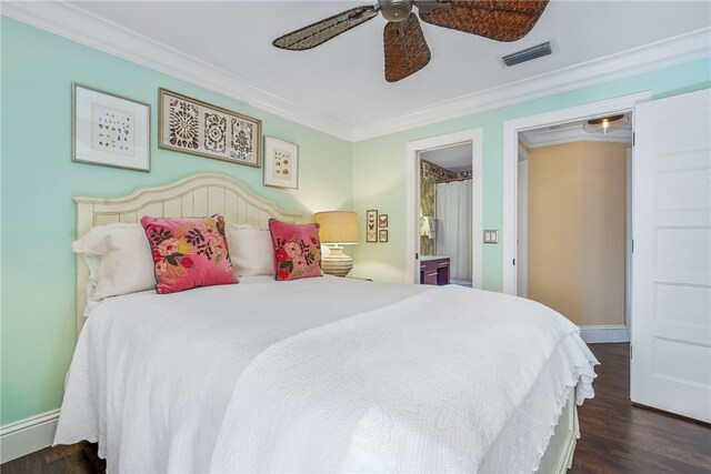 bedroom featuring ensuite bathroom, ceiling fan, dark hardwood / wood-style flooring, and ornamental molding