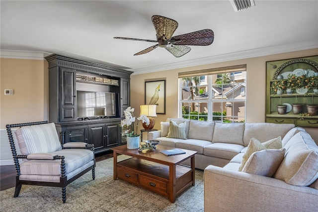 living room with wood-type flooring, ceiling fan, and ornamental molding