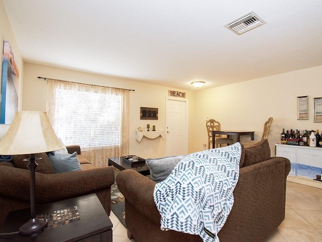 4368 56th Ln, Vero Beach, FL 32967 - living room featuring light tile patterned floors