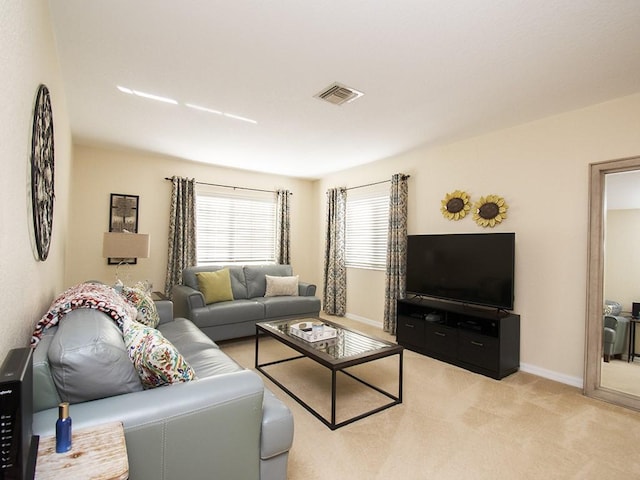 4368 56th Ln, Vero Beach, FL 32967 - living room featuring light carpet and baseboards