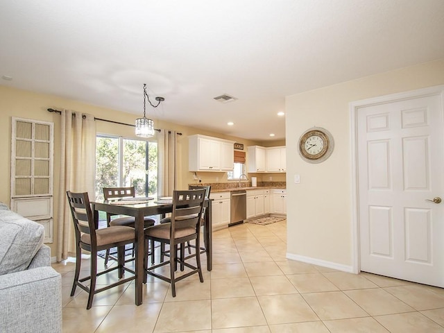 4368 56th Ln, Vero Beach, FL 32967 - dining space with light tile patterned flooring and recessed lighting
