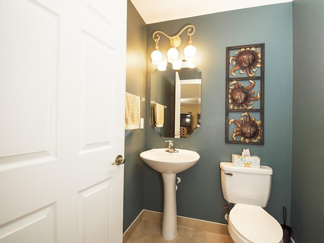 4368 56th Ln, Vero Beach, FL 32967 - half bath with toilet and tile patterned floors