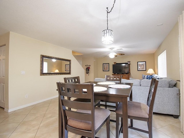 4368 56th Ln, Vero Beach, FL 32967 - dining space featuring a ceiling fan and light tile patterned flooring