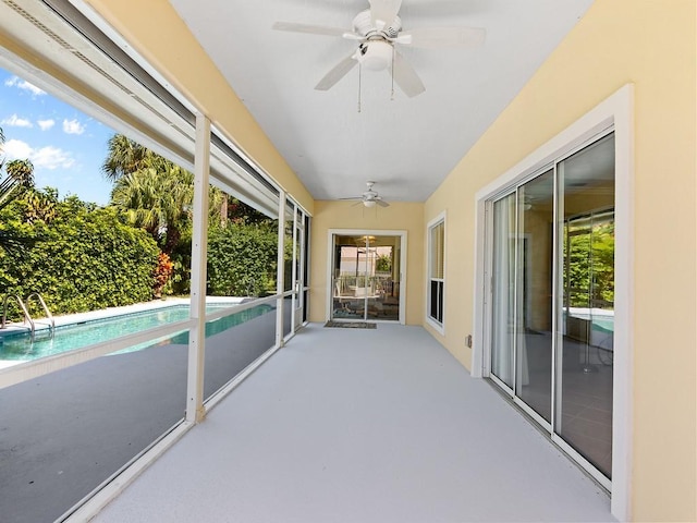 exterior space featuring ceiling fan