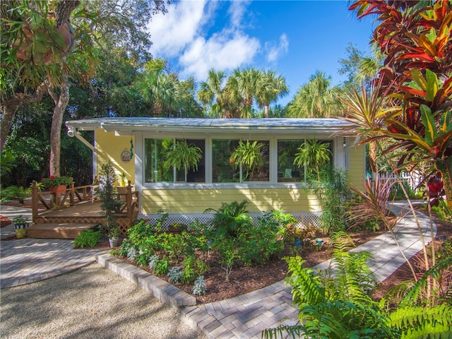 exterior space featuring a wooden deck