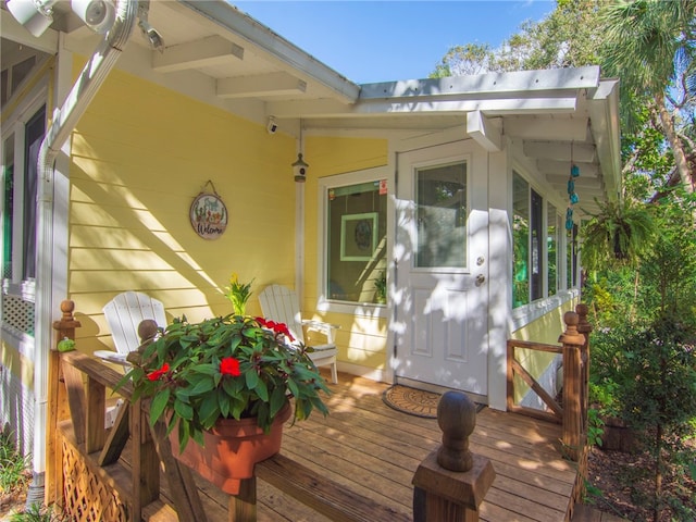 entrance to property with a deck