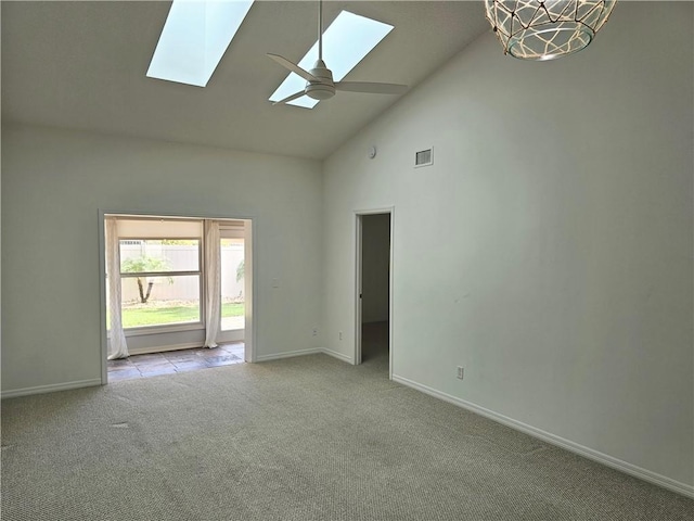 542 9th Pl, Vero Beach, FL 32960 - carpeted spare room with a skylight, high vaulted ceiling, and ceiling fan