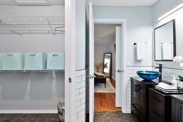 bathroom with vanity and tile patterned floors