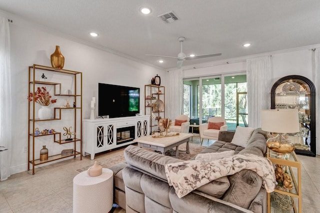 living room featuring visible vents, recessed lighting, a ceiling fan, and ornamental molding