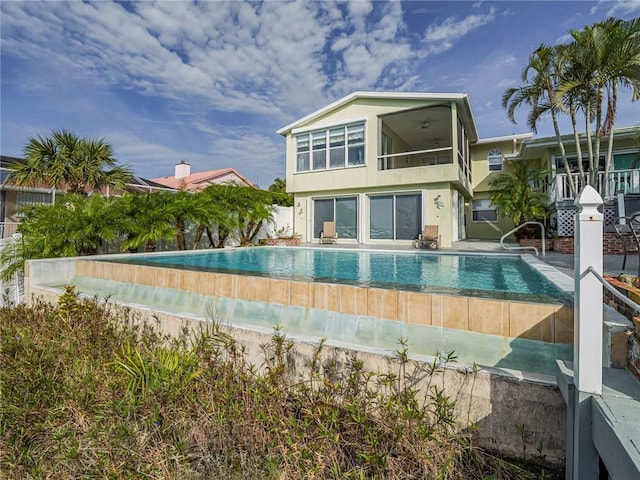 back of house with a patio area