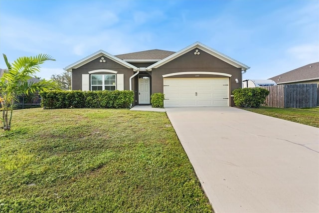 single story home with a front yard and a garage