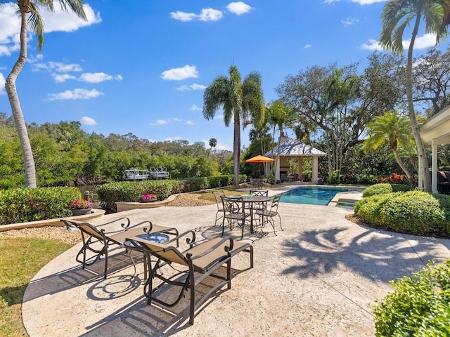 exterior space featuring a patio and a gazebo