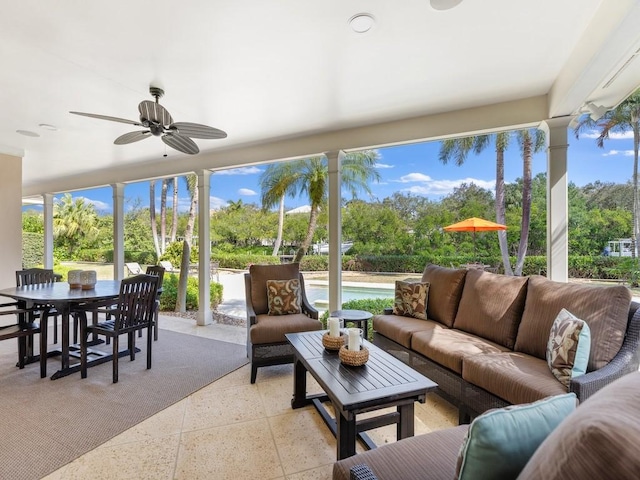 sunroom / solarium with ceiling fan