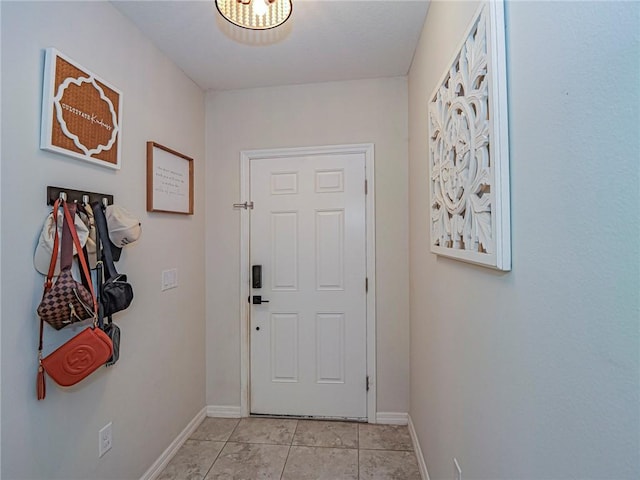 entryway featuring light tile patterned flooring