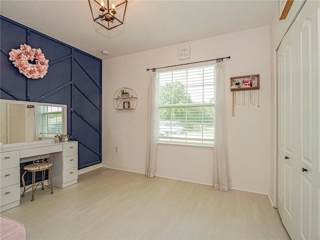 unfurnished office featuring light hardwood / wood-style flooring