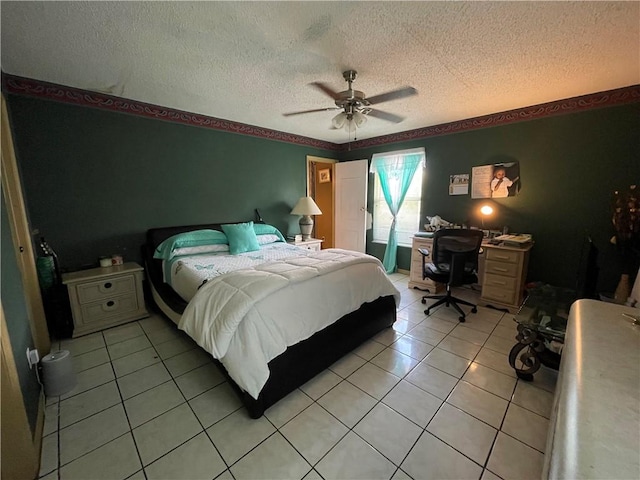 bedroom featuring ceiling fan, a textured ceiling, and light tile patterned floors