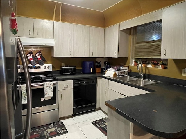 kitchen with light tile patterned flooring, appliances with stainless steel finishes, sink, and kitchen peninsula