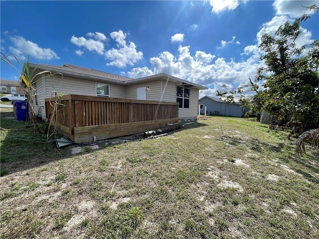 rear view of house with a lawn