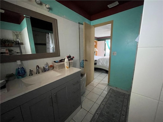 bathroom featuring vanity and tile patterned floors