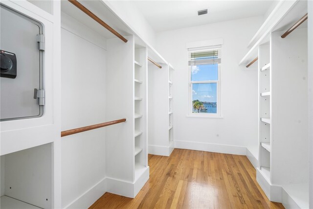 walk in closet featuring light wood-type flooring