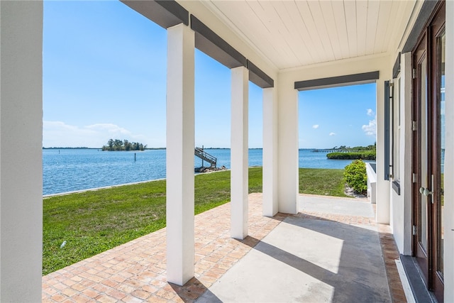 view of patio / terrace with a water view