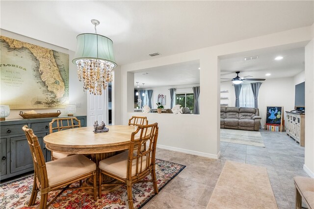 dining space with ceiling fan