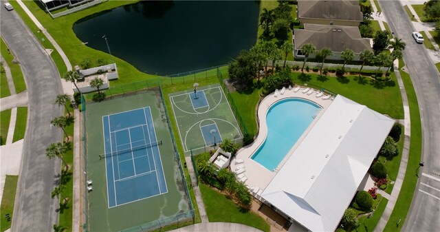 birds eye view of property featuring a water view