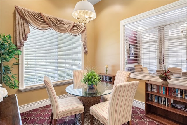 dining room with a chandelier