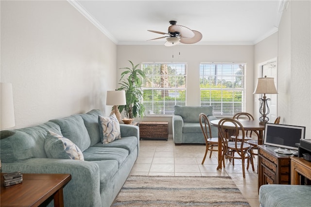 tiled living room featuring ceiling fan and crown molding