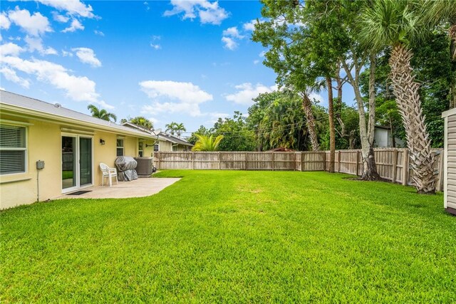 226 21st Ave, Vero Beach, FL 32962 - view of yard with a patio area and central air condition unit