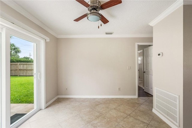 226 21st Ave, Vero Beach, FL 32962 - spare room featuring crown molding, ceiling fan, light tile patterned flooring, baseboards, and a textured ceiling