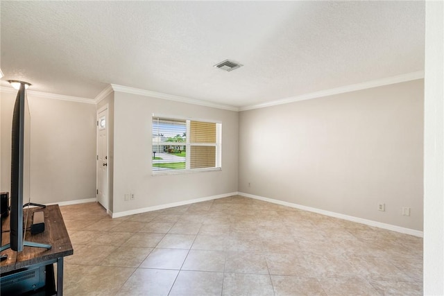 226 21st Ave, Vero Beach, FL 32962 - empty room featuring ornamental molding, light tile patterned floors, a textured ceiling, and baseboards