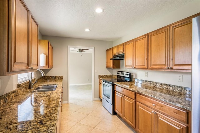 226 21st Ave, Vero Beach, FL 32962 - kitchen with stainless steel electric stove, a sink, under cabinet range hood, a textured ceiling, and recessed lighting