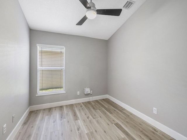 508 Calamondin Way SW, Vero Beach, FL 32968 - spare room featuring visible vents, a ceiling fan, wood finished floors, and a wealth of natural light