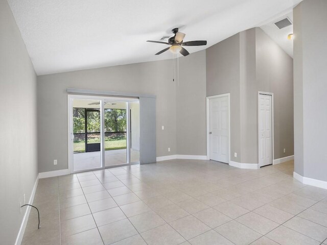 508 Calamondin Way SW, Vero Beach, FL 32968 - unfurnished room featuring visible vents, ceiling fan, light tile patterned floors, and high vaulted ceiling