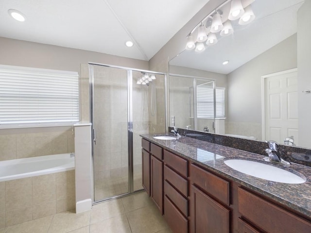 508 Calamondin Way SW, Vero Beach, FL 32968 - bathroom with a sink, tile patterned floors, vaulted ceiling, and a stall shower