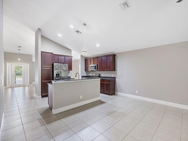 508 Calamondin Way SW, Vero Beach, FL 32968 - kitchen with visible vents, a sink, light tile patterned floors, and stainless steel appliances