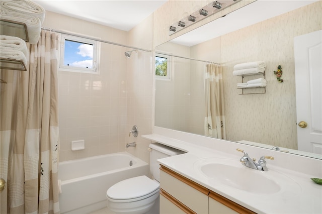 full bathroom with shower / bath combination with curtain, toilet, and vanity