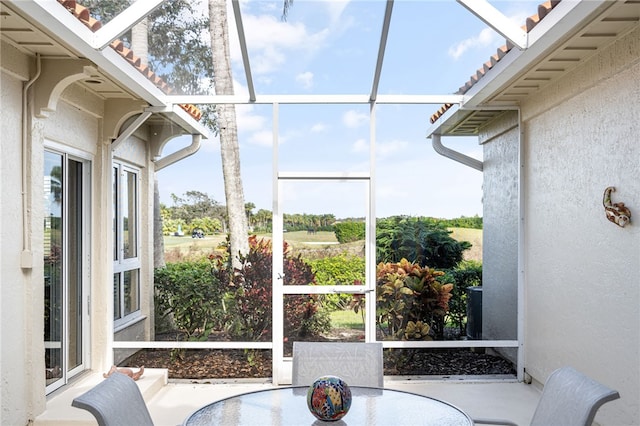 sunroom featuring plenty of natural light