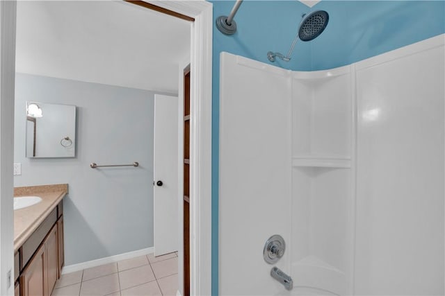 1011 Royal Palm Blvd Unit B3, Vero Beach, FL 32960 - bathroom featuring vanity, tile patterned floors, and  shower combination