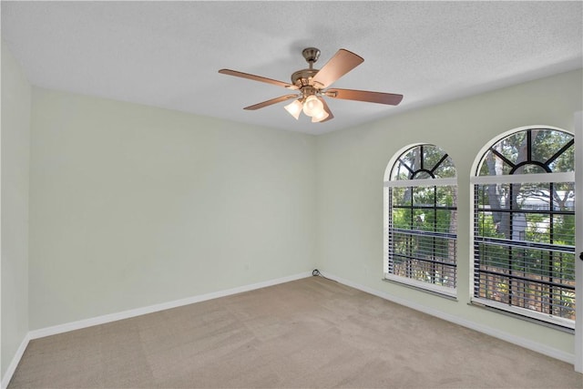 1011 Royal Palm Blvd Unit B3, Vero Beach, FL 32960 - spare room with carpet floors and a ceiling fan