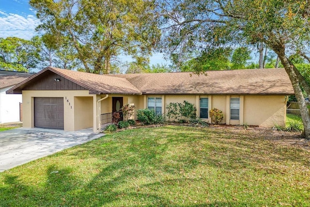 ranch-style house with a garage and a front lawn